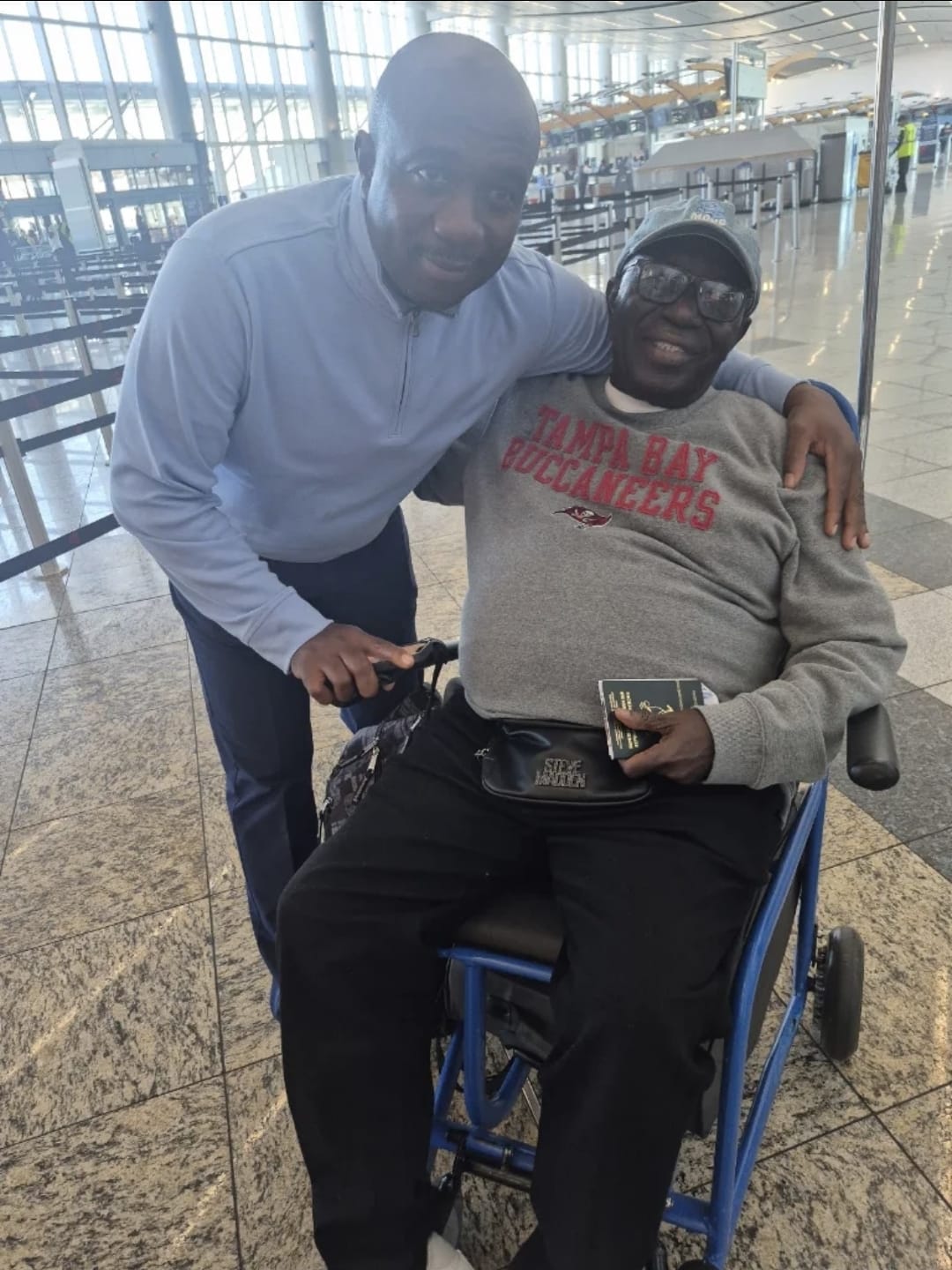Mr. Thomas and his Beteli Care caregiver together at the airport